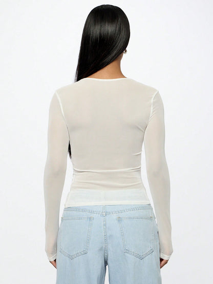 Camiseta Ajustada de Mangas Longas e Gola Redonda em Tela